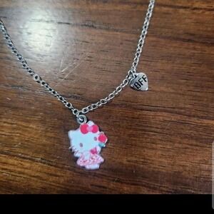 Sanrio Hello Kitty necklace. Silver color chain measures about 19.5 inches